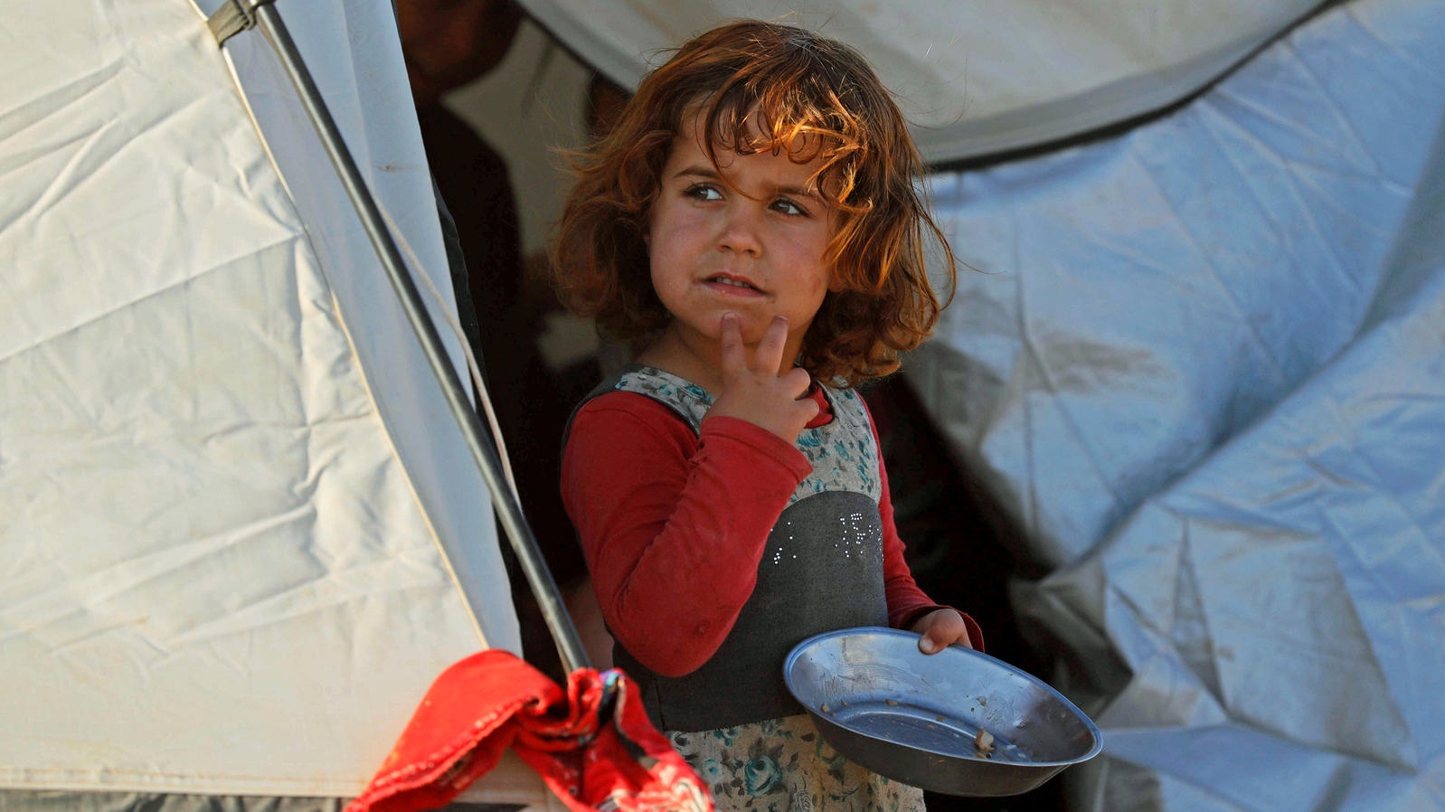 Syrien: Rotes Kreuz beklagt Anstieg der Gewalt gegen die Zivilbevölkerung Mädchen in einem syrischen Flüchtlingscamp