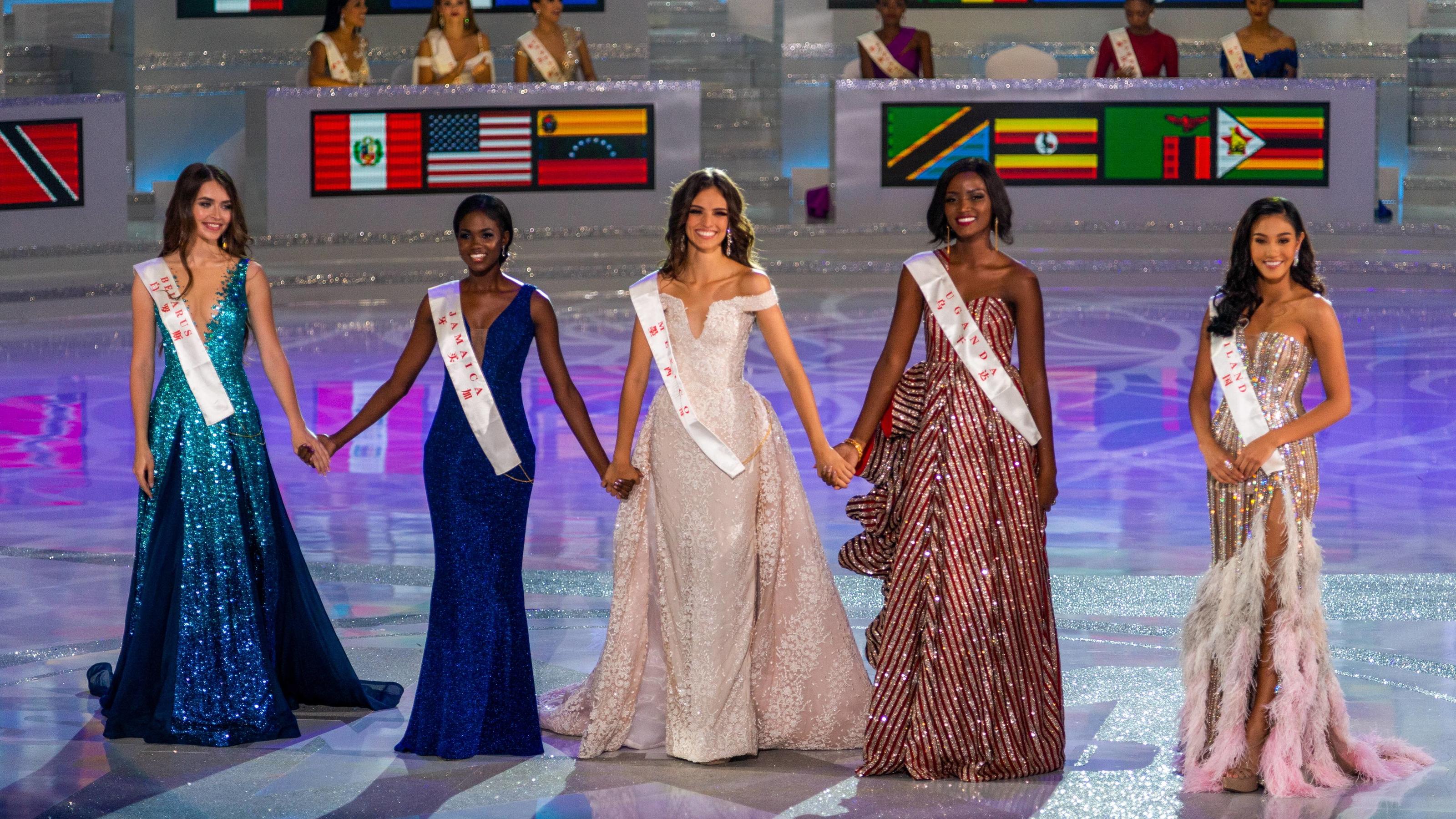 SANYA, CHINA â DECEMBER 8, 2018: Contestants Nicolene Pichapa Limsnukan of Thailand, Quiin Abenakyo of Uganda, Vanessa Ponce De Leon of Mexico, Kadijah Robinson of Jamaica, and Maria Vasilevich of Belarus, from right, at the Miss World 2018 beauty pa