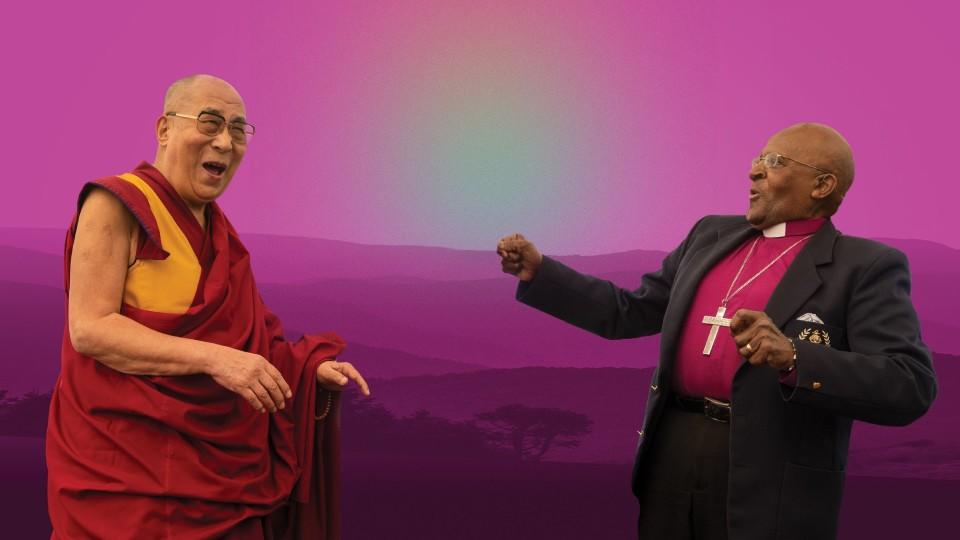 Der Dalai Lama Tenzin Gyatso und Erzbischof Desmond Tutu lachen gemeinsam.
